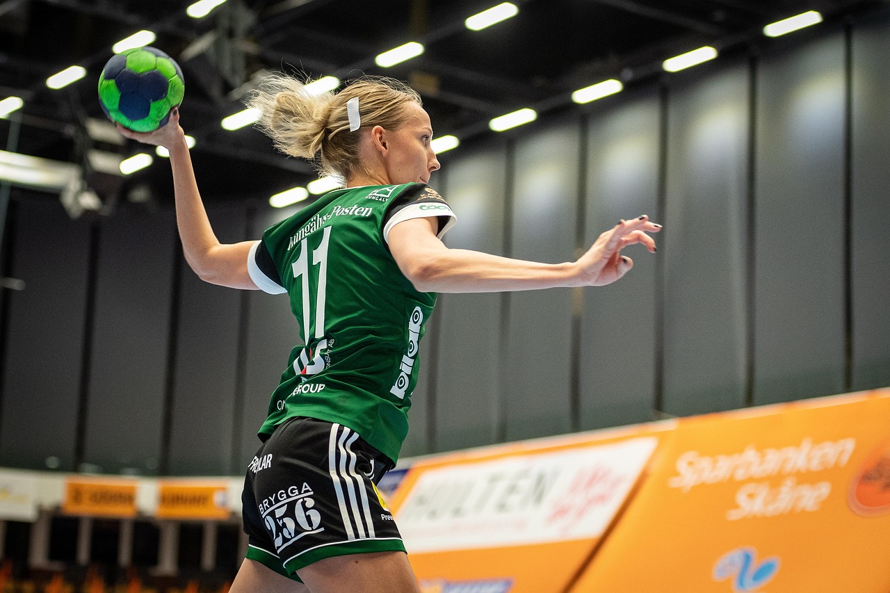 Athlete playing handball for sports injury massage Tulsa